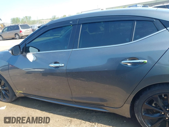 2017 Nissan Maxima SV z VIN 1N4AA6AP7HC454942, wystawiony jako IAAI lot #42447538 z przebiegiem 199 525 mil mil oraz . Historia ofert i sprzedaży dostępna na DreamBid. Obrazek 15.