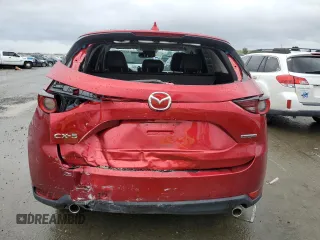2021 Mazda CX-5 Touring with VIN JM3KFACM8M0406987, listed as a Copart auction lot 45241535 with 57,673 mi miles and Salvage Title. Bid and sale history available at carsss.com. Image 6.
