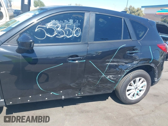 2013 Mazda CX-5 Touring with VIN JM3KE2CEXD0153589, listed as a IAAI auction lot 41855356 with 86,030 mi miles and . Bid and sale history available at DreamBid. Image 6.