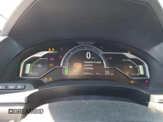 2020 Honda Clarity Plug-In Hybrid with VIN JHMZC5F13LC002533, listed as a Copart auction lot 76206644 with 144,022 mi miles and Salvage Title. Bid and sale history available at carsss.com. Image 9.