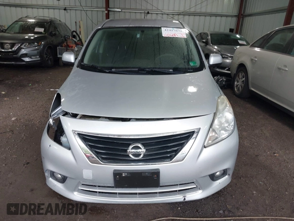 2012 Nissan Versa SV with VIN 3N1CN7AP1CL928493, listed as a IAAI auction lot 42417672 with 140,687 mi miles and . Bid and sale history available at DreamBid. Image 13.