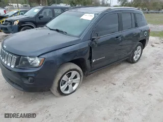 2014 Jeep Compass Latitude with VIN 1C4NJCEB7ED651270, listed as a IAAI auction lot 41561557 with 208,874 mi miles. Bid and sale history available at carsss.com. Image 2.