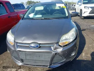 2012 Ford Focus SE with VIN 1FAHP3F29CL327580, listed as a IAAI auction lot 41882318 with 156,511 mi miles. Bid and sale history available at carsss.com. Image 6.