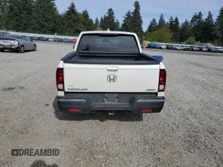 2018 Honda Ridgeline RTL-T с VIN 5FPYK3F61JB001663, выставлен на аукционе Copart как лот 55118125 с пробегом 101 149 миль миль и Списание • Salvage title. История ставок и продаж доступна на DreamBid. Изображение 6.