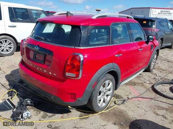 2019 MINI Countryman Cooper with VIN WMZYS7C55K3F45774, listed as a IAAI auction lot 41720883 with 124,599 mi miles. Bid and sale history available at carsss.com. Image 4.