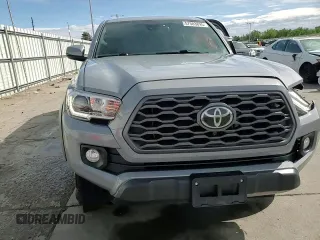 2020 Toyota Tacoma SR5 with VIN 3TMDZ5BN6LM097302, listed as a Copart auction lot 57503895 with 77,212 mi miles and Salvage title. Bid and sale history available at DreamBid. Image 13.