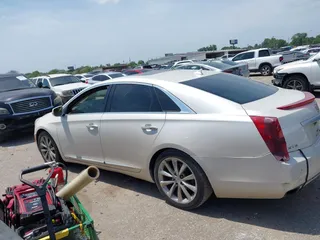 2013 Cadillac XTS Premium z VIN 2G61S5S33D9235025, wystawiony jako IAAI lot #42288742 z przebiegiem 180 221 mil mil oraz . Historia ofert i sprzedaży dostępna na DreamBid. Obrazek 14.