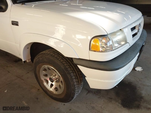 2002 Mazda B-Series 2WD Truck DS with VIN 4F4YR16V42TM25828, listed as a IAAI auction lot 41440414 with 132,334 mi miles. Bid and sale history available at carsss.com. Image 16.