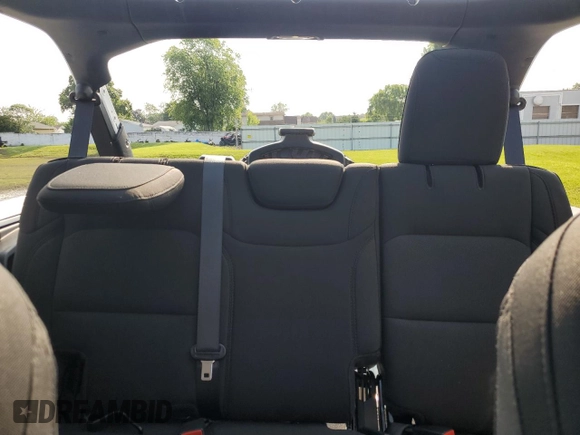 2021 Jeep Wrangler Unlimited 80th Anniversary z VIN 1C4HJXDG4MW794519, wystawiony jako Copart lot #60116105 z przebiegiem 25 708 mil mil oraz Szkoda całkowita • Salvage title. Historia ofert i sprzedaży dostępna na DreamBid. Obrazek 10.