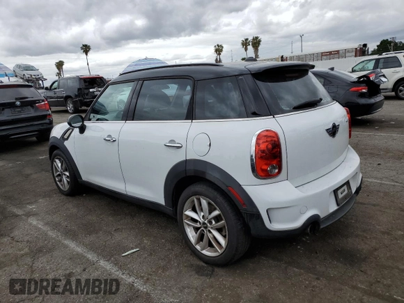 2013 MINI Countryman S with VIN WMWZC3C54DWP24877, listed as a Copart auction lot 53583655 with 97,734 mi miles and Salvage title. Bid and sale history available at DreamBid. Image 2.