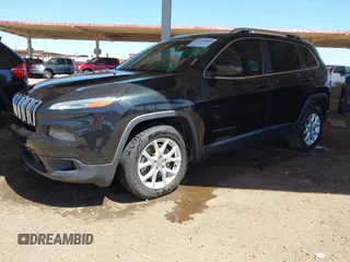 2015 Jeep Cherokee Latitude with VIN 1C4PJLCB8FW669150, listed as a IAAI auction lot 42122669 with 194,525 mi miles and . Bid and sale history available at DreamBid. Image 2.
