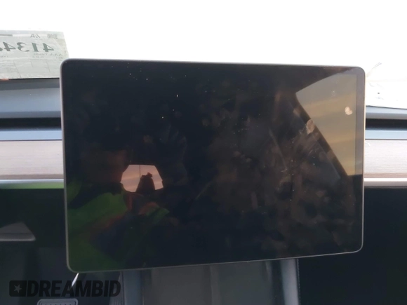 2023 Tesla Model Y Long Range z VIN 7SAYGDEE2PA166042, wystawiony jako IAAI lot #41348960 z przebiegiem Nie podano mil oraz . Historia ofert i sprzedaży dostępna na DreamBid. Obrazek 15.