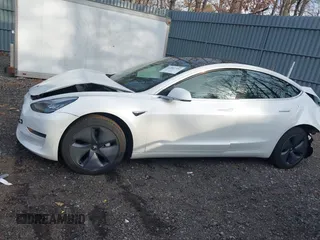 2020 Tesla Model 3 Long Range with VIN 5YJ3E1EB6LF618931, listed as a IAAI auction lot 41867451 with 47,502 mi miles and . Bid and sale history available at DreamBid. Image 14.