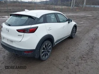 2019 Mazda CX-3 Grand Touring with VIN JM1DKFD76K0426879, listed as a IAAI auction lot 41669200 with 31,881 mi miles. Bid and sale history available at carsss.com. Image 4.