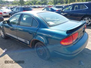 2003 Oldsmobile Alero GL1 z VIN 1G3NL52F53C153441, wystawiony jako IAAI lot #39799738 z przebiegiem 180 025 mil mil oraz . Historia ofert i sprzedaży dostępna na DreamBid. Obrazek 3.