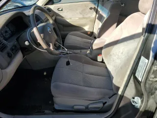 2001 Mazda 626 LX with VIN 1YVGF22D815242283, listed as a Copart auction lot 42141985 with 36,448 mi miles and Salvage Title. Bid and sale history available at carsss.com. Image 7.