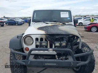 2012 Jeep Wrangler Unlimited Call of Duty MW3 with VIN 1C4BJWFG2CL279645, listed as a IAAI auction lot 41913375 with 1 mi miles. Bid and sale history available at carsss.com. Image 6.