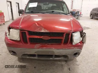 2003 Ford Explorer Sport Trac XLS z VIN 1FMZU67EX3UC27706, wystawiony jako IAAI lot #42214344 z przebiegiem 181 537 mil mil oraz . Historia ofert i sprzedaży dostępna na DreamBid. Obrazek 6.