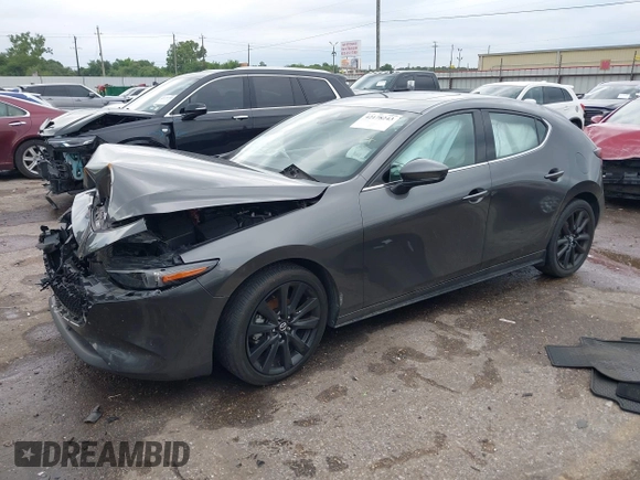 2021 Mazda 3 Premium z VIN JM1BPAML1M1318708, wystawiony jako IAAI lot #42178243 z przebiegiem 62 455 mil mil oraz . Historia ofert i sprzedaży dostępna na DreamBid. Obrazek 17.