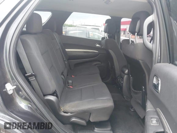 2014 Dodge Durango SXT with VIN 1C4RDJAG7EC307118, listed as a IAAI auction lot 42168781 with 92,977 mi miles and . Bid and sale history available at DreamBid. Image 8.