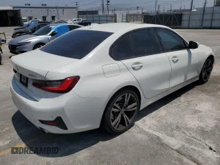 2022 BMW 3 Series 330i with VIN 3MW5R1J04N8C53879, listed as a Copart auction lot 57444544 with 27,972 mi miles and Salvage Title. Bid and sale history available at carsss.com. Image 3.