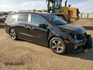 2020 Honda Odyssey Touring with VIN 5FNRL6H87LB007609, listed as a Copart auction lot 84562954 with 22,763 mi miles and Salvage Title. Bid and sale history available at DreamBid. Image 4.
