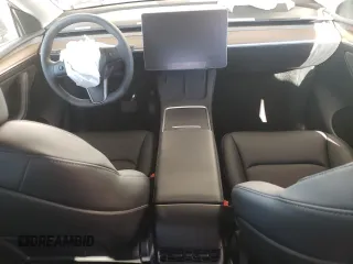 2024 Tesla Model Y Long Range with VIN 7SAYGDEE4RF127409, listed as a Copart auction lot 84274794 with 14,246 mi miles and Salvage title. Bid and sale history available at DreamBid. Image 8.