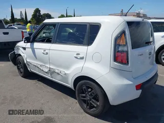 2011 Kia Soul + with VIN KNDJT2A21B7722613, listed as a IAAI auction lot 42054581 with 130,482 mi miles. Bid and sale history available at carsss.com. Image 3.