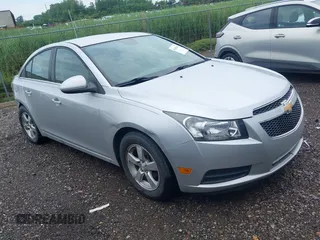 2014 Chevrolet Cruze 1LT with VIN 1G1PC5SB4E7153697, listed as a IAAI auction lot 42682055 with 273,905 mi miles and . Bid and sale history available at DreamBid. Image 1.