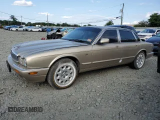 1999 Jaguar XJ with VIN SAJHD1042XC866633, listed as a Copart auction lot 66133755 with Not provided miles and Salvage title. Bid and sale history available at DreamBid. Image 1.
