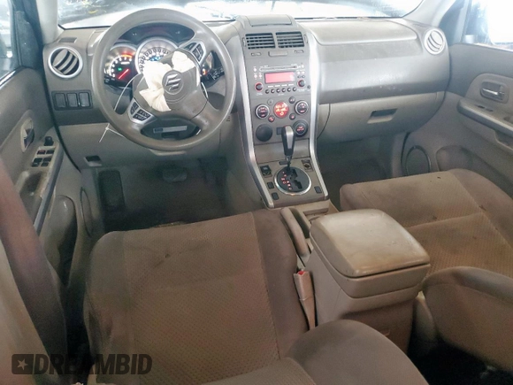 2011 Suzuki Grand Vitara Premium with VIN JS3TD0D28B4102365, listed as a Copart auction lot 60560495 with 176,190 mi miles and Salvage title. Bid and sale history available at DreamBid. Image 8.