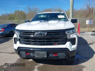 2023 Chevrolet Silverado 1500 LT Trail Boss with VIN 3GCUDFED3PG197885, listed as a IAAI auction lot 41733427 with 64,911 mi miles and . Bid and sale history available at DreamBid. Image 12.