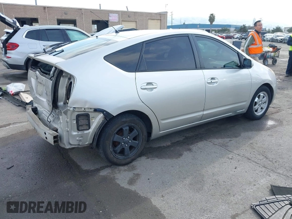 2005 Toyota Prius with VIN JTDKB20U257017611, listed as a IAAI auction lot 42087781 with 263,985 mi miles. Bid and sale history available at carsss.com. Image 4.