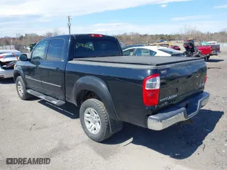 2005 Toyota Tundra SR5 with VIN 5TBDT441X5S491032, listed as a IAAI auction lot 41840188 with 303,466 mi miles. Bid and sale history available at carsss.com. Image 3.