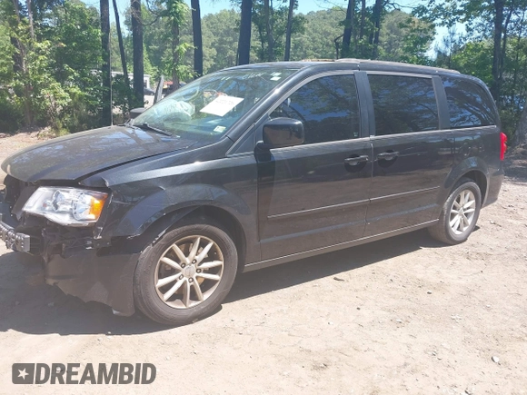 2014 Dodge Grand Caravan SXT with VIN 2C4RDGCG2ER313531, listed as a IAAI auction lot 42221726 with 177,065 mi miles and . Bid and sale history available at DreamBid. Image 2.