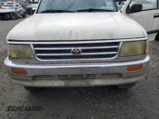 1997 Toyota T100 DX z VIN JT4UN22DXV0041578, wystawiony jako Copart lot #77388104 z przebiegiem 333 587 mil mil oraz Tytuł czysty. Historia ofert i sprzedaży dostępna na DreamBid. Obrazek 11.
