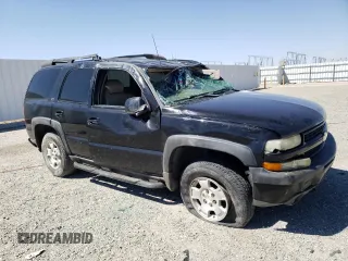 2002 Chevrolet Tahoe LT z VIN 1GNEK13T42R152851, wystawiony jako Copart lot #67958403 z przebiegiem 257 989 mil mil oraz Szkoda całkowita • Salvage title. Historia ofert i sprzedaży dostępna na DreamBid. Obrazek 4.