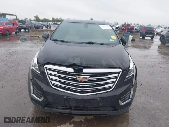 2017 Cadillac XT5 FWD with VIN 1GYKNARS0HZ317508, listed as a IAAI auction lot 40818768 with 132,598 mi miles. Bid and sale history available at carsss.com. Image 12.