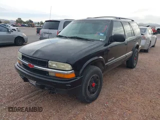 2002 Chevrolet Blazer LS z VIN 1GNDT13W42K124494, wystawiony jako IAAI lot #42266284 z przebiegiem 259 857 mil mil oraz . Historia ofert i sprzedaży dostępna na DreamBid. Obrazek 2.