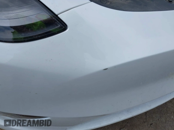 2023 Tesla Model Y Long Range with VIN 7SAYGAEEXPF776370, listed as a IAAI auction lot 42127512 with 27,120 mi miles and . Bid and sale history available at DreamBid. Image 21.