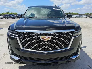 2023 Cadillac Escalade 4WD Premium Luxury z VIN 1GYS4BKL7PR332923, wystawiony jako Copart lot #57442025 z przebiegiem 56 886 mil mil oraz Tytuł czysty. Historia ofert i sprzedaży dostępna na DreamBid. Obrazek 5.