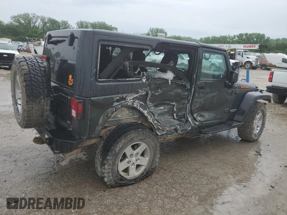 2011 Jeep Wrangler Unlimited Rubicon z VIN 1J4BA6H16BL615993, wystawiony jako Copart lot #55420275 z przebiegiem 200 403 mil mil oraz Szkoda całkowita • Salvage title. Historia ofert i sprzedaży dostępna na DreamBid. Obrazek 3.