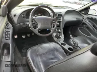 2003 Ford Mustang Deluxe with VIN 1FAFP44433F443082, listed as a Copart auction lot 59916015 with 111,999 mi miles and Salvage title. Bid and sale history available at DreamBid. Image 8.