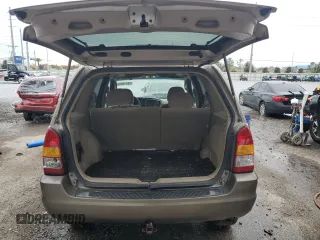 2002 Mazda Tribute LX with VIN 4F2YU09132KM24637, listed as a Copart auction lot 88919855 with 211,198 mi miles and Salvage Title. Bid and sale history available at carsss.com. Image 6.