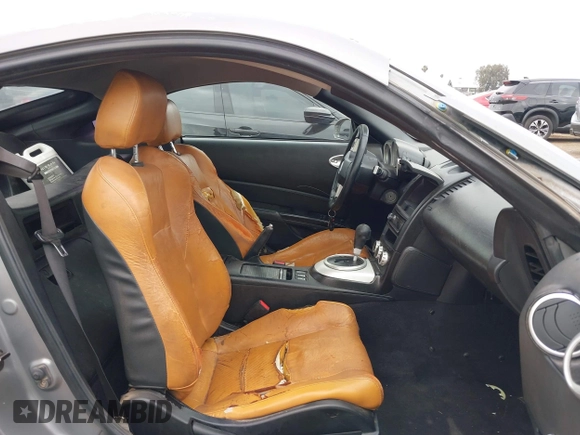 2006 Nissan 350Z Touring z VIN JN1AZ34D86M312841, wystawiony jako IAAI lot #42336869 z przebiegiem 138 191 mil mil oraz . Historia ofert i sprzedaży dostępna na DreamBid. Obrazek 5.