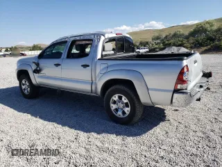 2010 Toyota Tacoma PreRunner with VIN 3TMJU4GN8AM095133, listed as a Copart auction lot 59602955 with 146,136 mi miles and Salvage title. Bid and sale history available at DreamBid. Image 2.