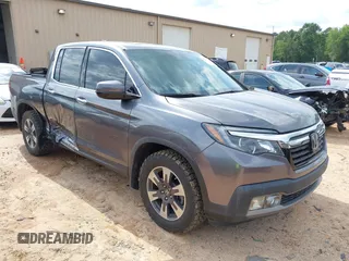 2017 Honda Ridgeline RTL-E with VIN 5FPYK3F71HB011631, listed as a IAAI auction lot 42435419 with 38,908 mi miles and . Bid and sale history available at DreamBid. Image 1.