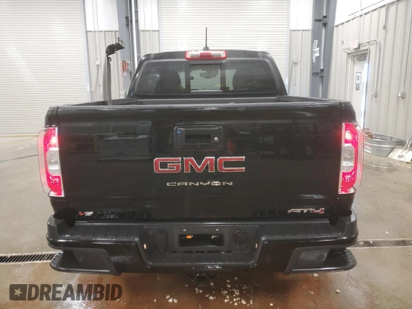 2021 GMC Canyon 4WD AT4 w/Cloth with VIN 1GTG6FEN0M1106579, listed as a Copart auction lot 81330184 with 29,630 mi miles and Salvage Title. Bid and sale history available at carsss.com. Image 6.