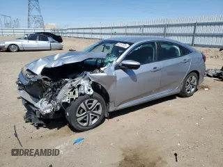 2017 Honda Civic LX z VIN 2HGFC2F56HH504402, wystawiony jako Copart lot #52211515 z przebiegiem 192 214 mil mil oraz Szkoda całkowita • Salvage title. Historia ofert i sprzedaży dostępna na DreamBid. Obrazek 1.
