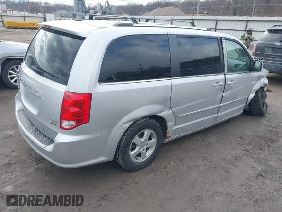 2011 Dodge Grand Caravan Crew with VIN 2D4RN5DG0BR751611, listed as a IAAI auction lot 41683889 with 181,551 mi miles and . Bid and sale history available at DreamBid. Image 4.